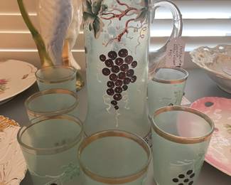 Unusual and unique hand painted German pitcher and glass set...beautiful colors!