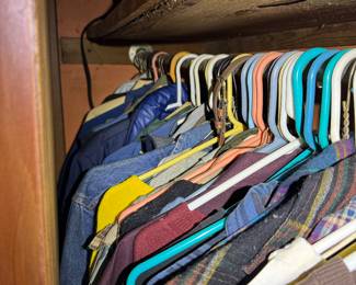 Basement rec room closet (door sticks, please be careful. (PACKED CLOSET)