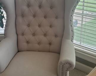 2 matching wing back chairs