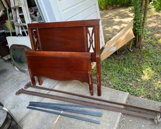 Vintage twin bed with rails and metal slats