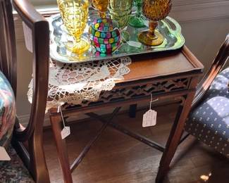 Vintage colored glass, antique butlers table with carved apron and stretcher details