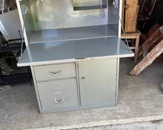 Showing the inside storage of the metal chest