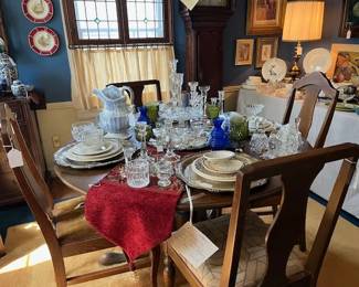 Antique round oak dining table, and more of the dining chairs