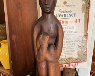 A close look at the hand carved wood sculpture, by Paul Griffin, vintage wood boxes, vintage King and I Poster