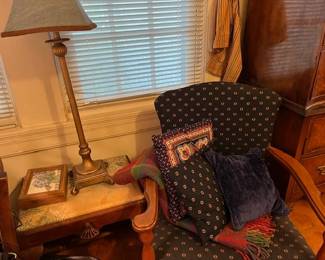 Vintage foot stool, lamp, vintage upholstered arm chair, cushions