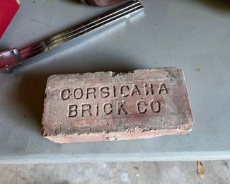 There is a stack of vintage bricks