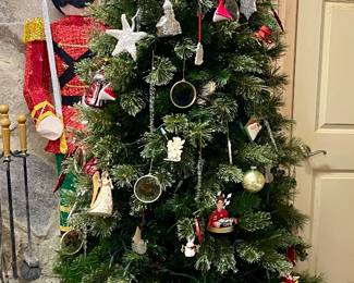 7’ LIGHTED CHRISTMAS TREE ON PLATFORM WITH CASTORS. (ORNAMENTS PRICED SEPARATELY)