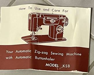 VINTAGE UNIVERSAL SEWING MACHINE & CABINET