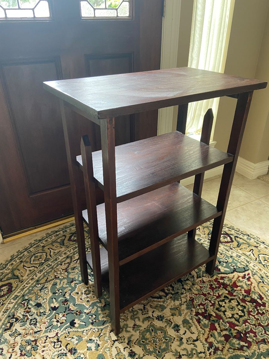 Mahogany finish mission oak style magazine bookcase. 32x22x14 inches HWD. $125