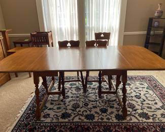 Heywood Wakefield Maple Drop Leaf Extendable Dining Table and chairs (4). Heywood Wakefield Maple Drop Leaf Extendable Dining Table and Chairs.  extended overall 84”x42”x29” H. Includes two 10” leaves as shown. Four matching chairs 33x18x18 overall. Solid maple mid century. $750. 