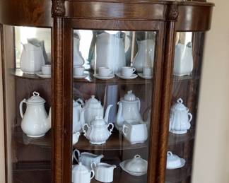 Antique oak curio cabinet mirror $400. Plexiglass. Lion foot. Stoneware sold separately 66 x 44 x 16
