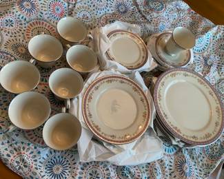 Lenox Amethyst pattern china, featuring a purple band and pastel floral design with a platinum rim. 
This pattern was produced by Lenox from 1982 to 1990. Eight 5 piece place settings $600. Like new never used.