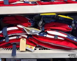 4578  7 DBX and 1 Mustang Survival Life Jackets 