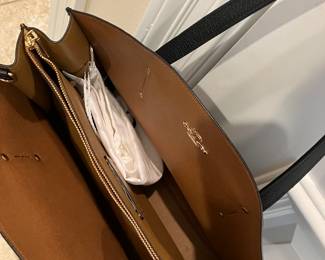 90	$150.00 	Coach Carryall Bag
