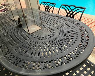 46	$600.00 	7' Long x 44 Wx 29H iron table with 6 armchairs 
5