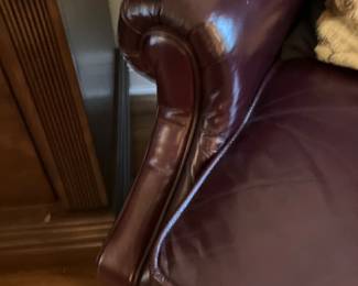 21 $140 each Wing back burgundy leatherette recliners (2)