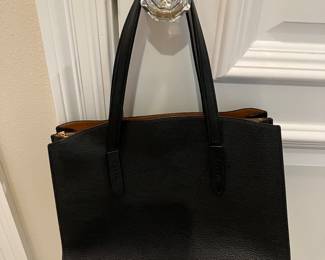 90	$150.00 	Coach Carryall Bag
