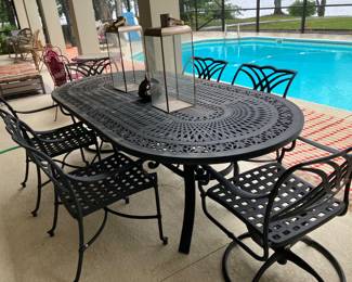 46	$600.00 	7' Long x 44 Wx 29H iron table with 6 armchairs 
