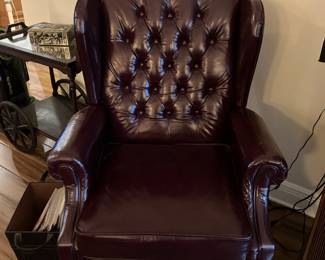 21 $140 each Wing back burgundy leatherette recliners (2)