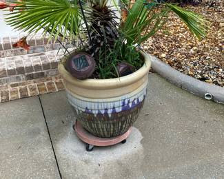 56 	$80 each	One of two Terracotta planters 23Tx22W
