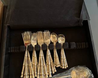 31 $200.00 Bamboo brass set of flatware