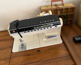 97	$150.00 	Singer Sewing Machine and Cabinet
