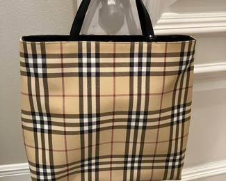 73	$150.00 	Burberry's Nova check purse 


