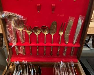 31 $200.00 Bamboo brass set of flatware