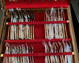 31 $200.00 Bamboo brass set of flatware