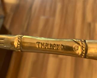 31 $200.00 Bamboo brass set of flatware