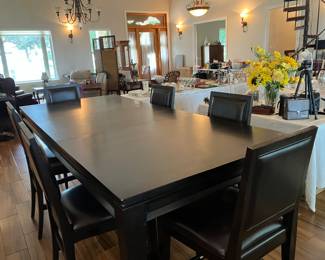 30 $600.00 Black dining table 8'table incl. 1 leavex42Wx36T with 6 chairs counter height, 24Hx20Wx42T
9