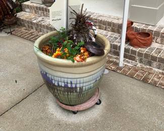 56 	$80 each	One of two Terracotta planters 23Tx22W
