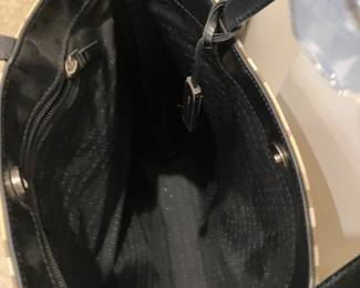 73	$150.00 	Burberry's Nova check purse 

