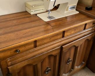 97	$150.00 	Singer Sewing Machine and Cabinet
