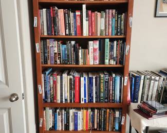 Books and bookshelf - military, political, faith based, coffee table selections