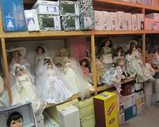 The Doll Collection is extensive. The boxes above and below the displayed dolls also have dolls in them,