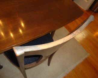 Some wearing on the top of the chairs