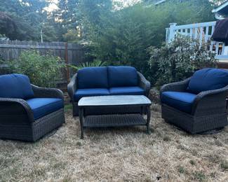 Love seat, rocker swivel chairs & a table