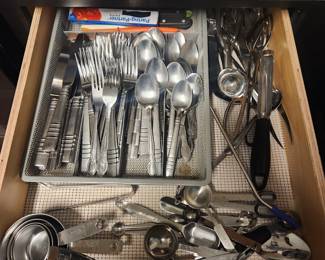Silverware, measuring cups, measuring spoons