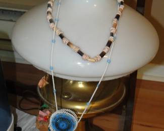 Lamp and beaded necklaces