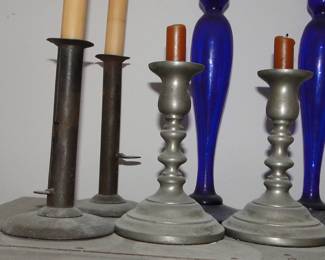 Candlesticks. The blue ones are not for sale.