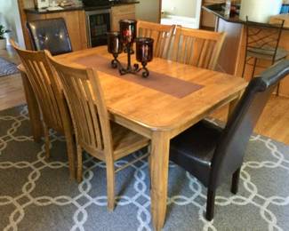 Custom Made Dining Table w/8 Armless Chairs & 2 Brown Leather Parson Chairs. 64" L w2 additional leaves.  Solid Wood.  