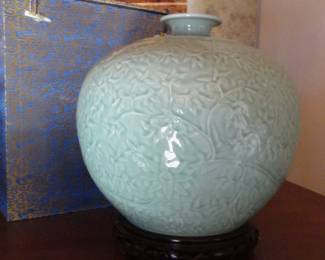 Greenware shadow vase with Imperial mark from Qing dynasty (1736-1795)
10” high x 12” dia. with silk storage box