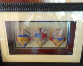 African miniature carved masks in carved wood shadow box 21-1/2” x 14-1/5” x 4”