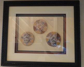 African clay medallion masks in carved wood shadow box 22-1/2” x 19-1/2” x 4”