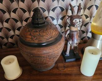 Vase and African art statue