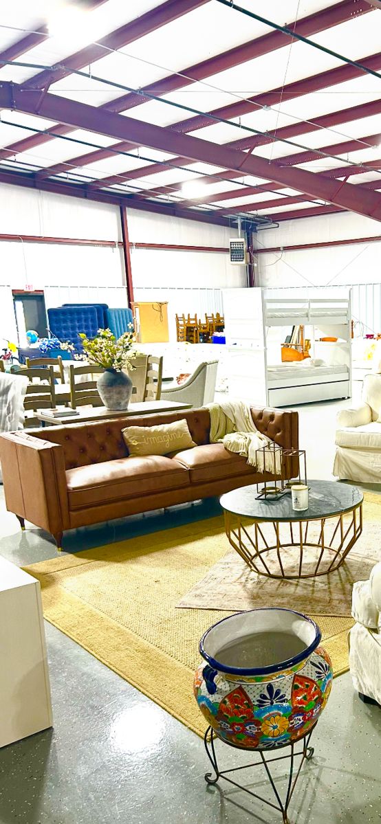 Warehouse with furniture. Vehicles and boat are not for sale