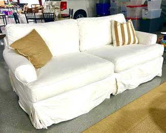 Slipcovered sofa