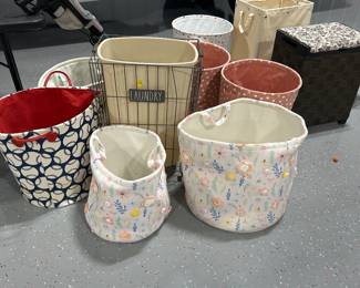 Lots of laundry basketsb