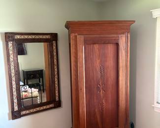 mirror and wooden armoire